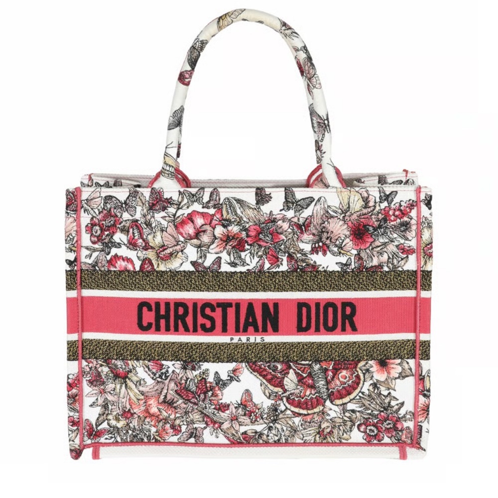 Christian Dior cloth floral book tote. Papers included serial number in photos.
